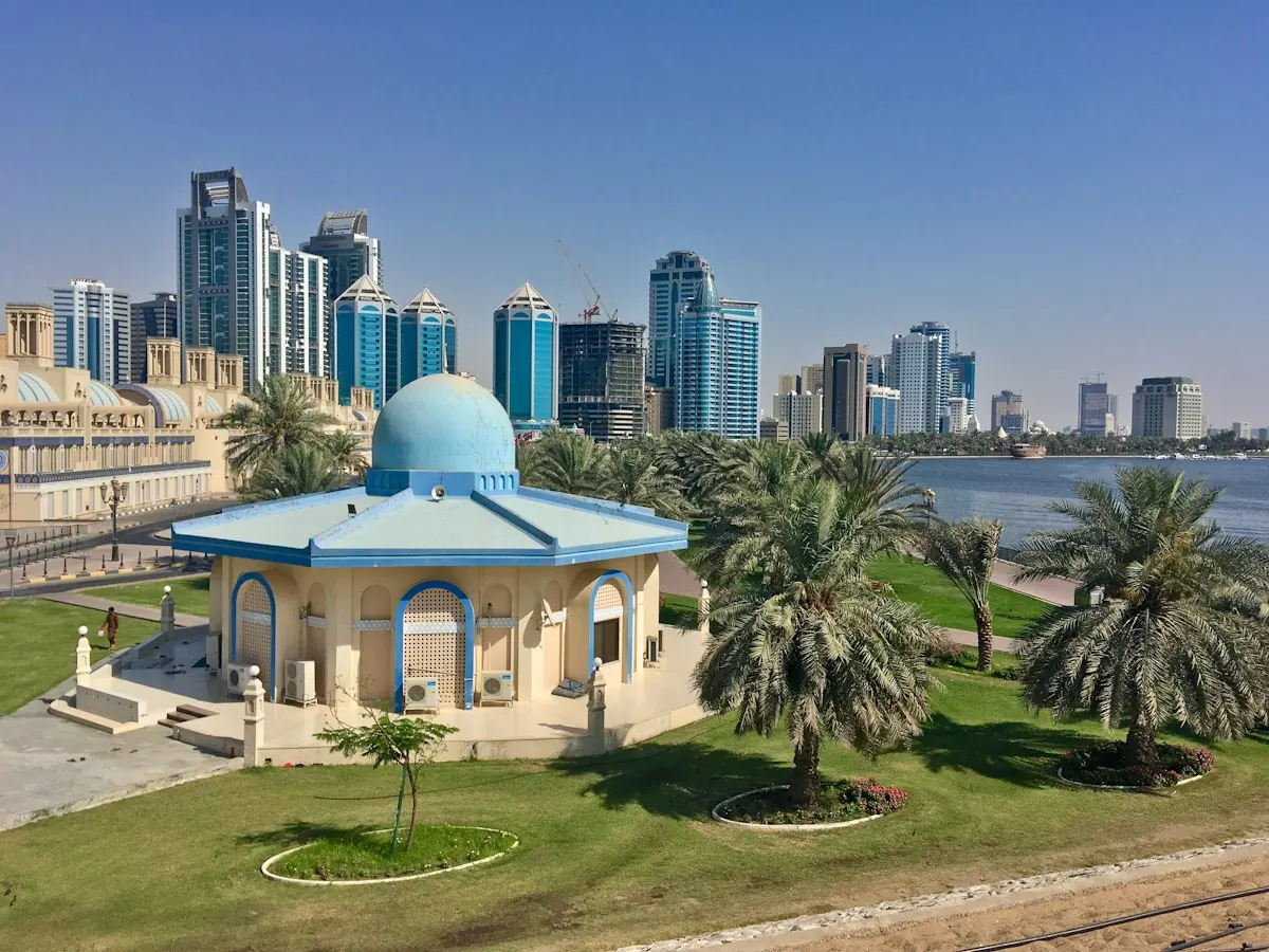 Sofa Cleaning Sharjah — Al Majaz waterfront Sharjah Al Majaz waterfront with blue-domed pavilion and city skyline — sofa cleaning and steam shampooing service in Sharjah by Al Haya Sofa Care