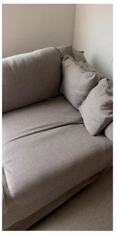 Grey fabric sofa restored and fresh after Al Haya Sofa Care deep cleaning service in Dubai Marina